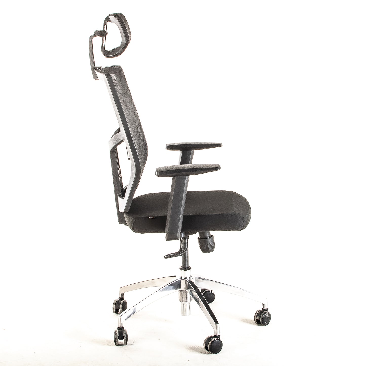 Silla operativa ergonómica reclinable con respaldo de malla BIT-1 con Cabecero y Apoyo Lumbar Regulable vista lateral.