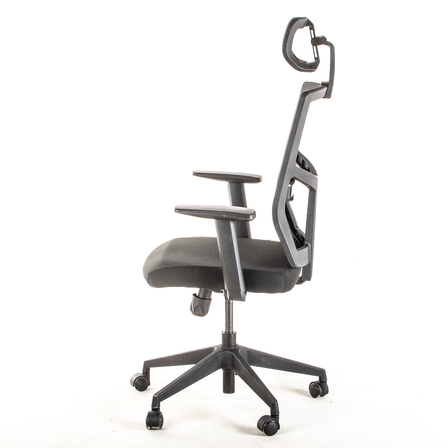 Silla operativa ergonómica con respaldo de malla BIT-2 Reclinable con Cabecero y Apoyo Lumbar Regulable vista lateral.